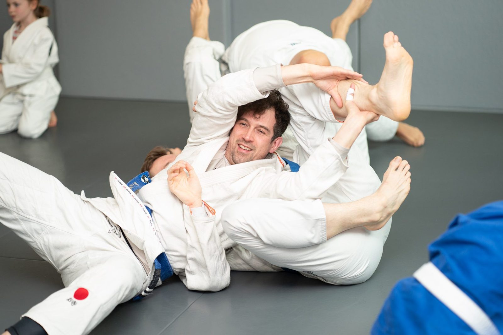 Lachen gehört dazu: Anfänger im Intro-Kurs des BJJ DOJO Berlin. Foto: Photo Blackbelt.